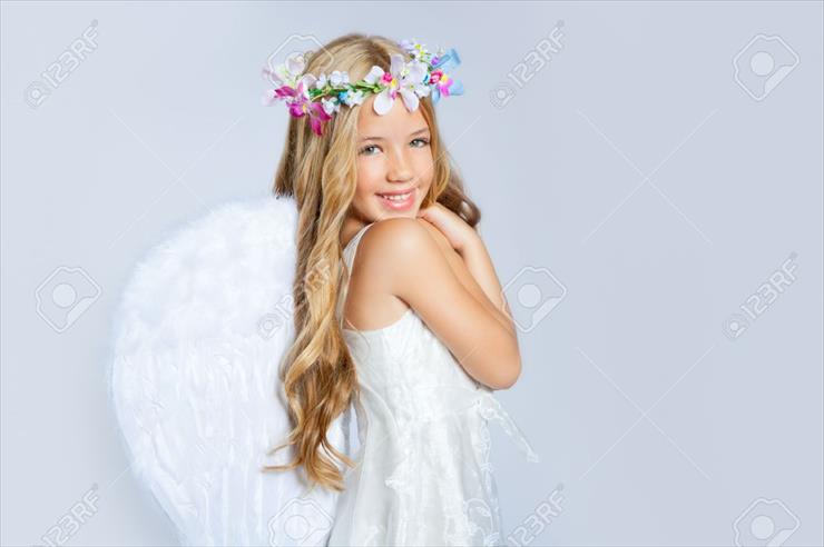 DZIECI ANIOŁY - 10437333-Angel-children-girl-with-white-wings-and-flowers-crown-Stock-Photo.jpg